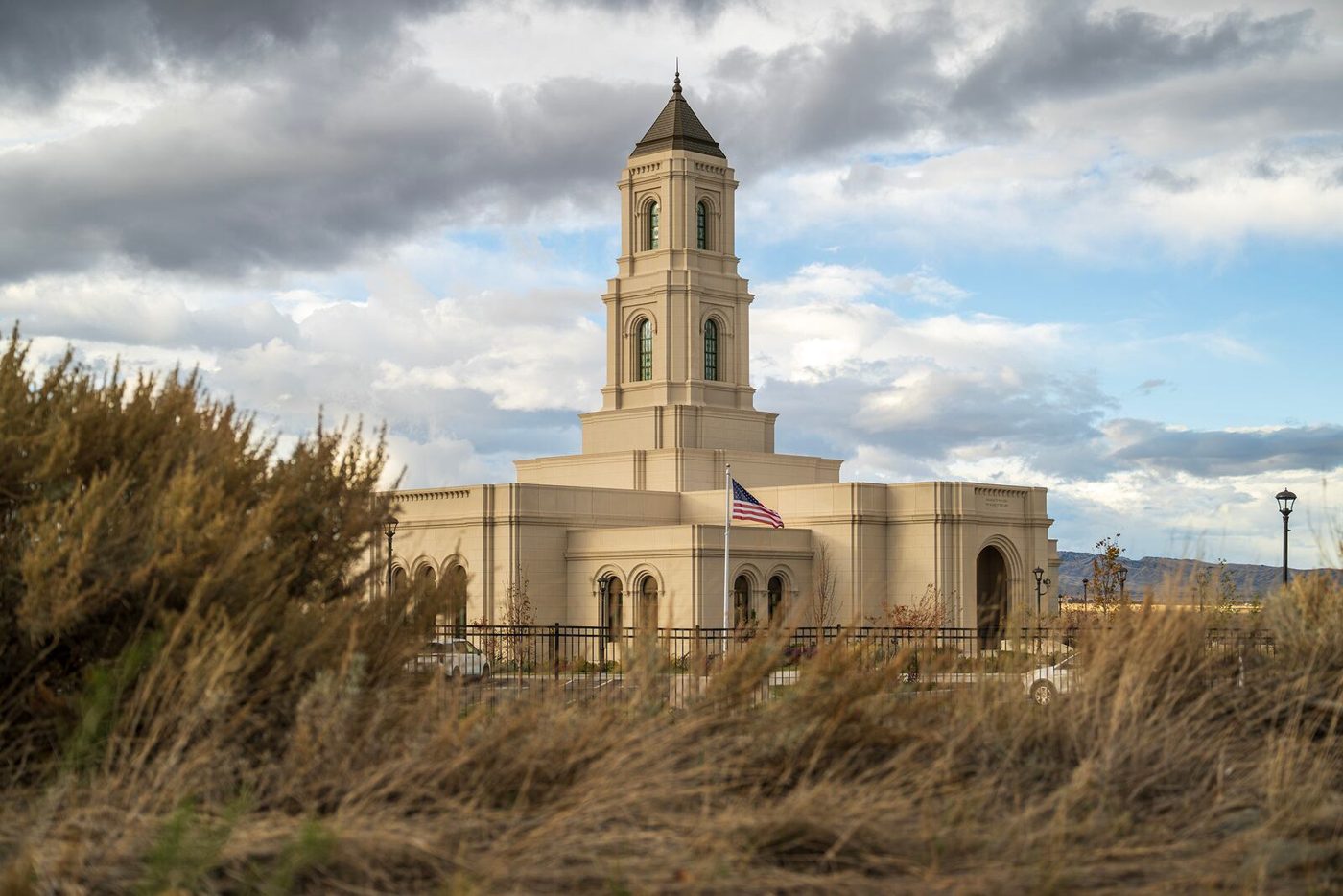 The Cody Wyoming Temple with its tall tower above dry grasses on Oct. 23, 2026