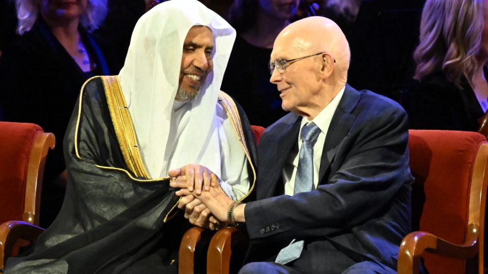 President Oaks greeting a faith leader at the G20 Interfaith Forum